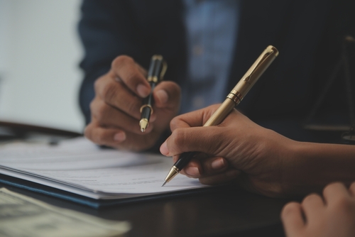 A lawyer helping a client in a social media accident lawsuit to help their child.