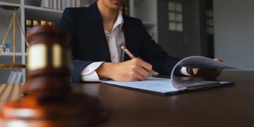 San Francisco Cartiva Implant Lawsuit Attorney reviewing medical records for a San Francisco Cartiva implant lawsuit